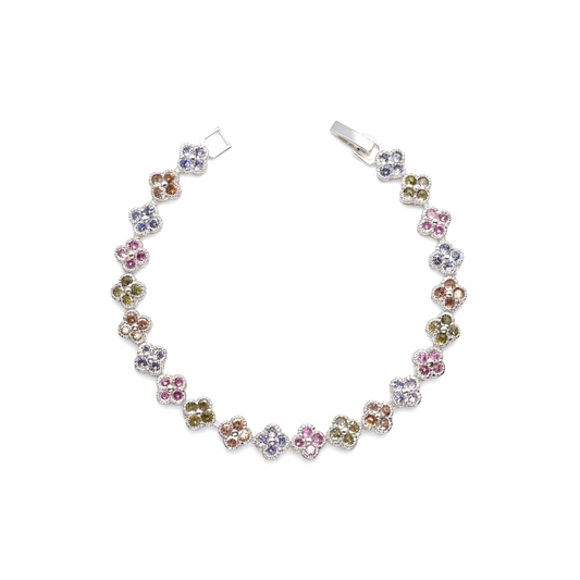 A silver-toned clover bracelet featuring multiple small gemstone clusters in pink, blue, green, and brown tones, displayed on a clean white background.