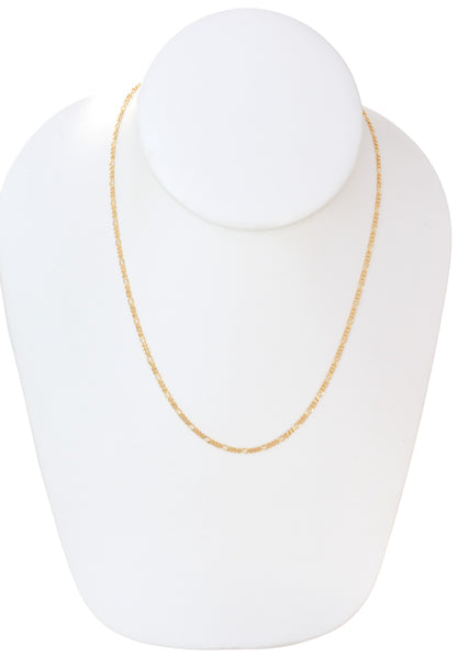 Gold Plated 60mm width Figaro Chain Necklace displayed on a jewelry display, available in 18", 20", 22", and 24" lengths.