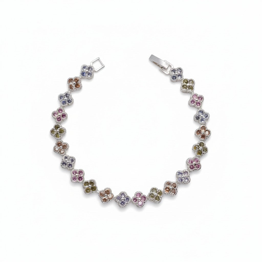 A silver-toned clover bracelet featuring multiple small gemstone clusters in pink, blue, green, and brown tones, displayed on a clean white background.