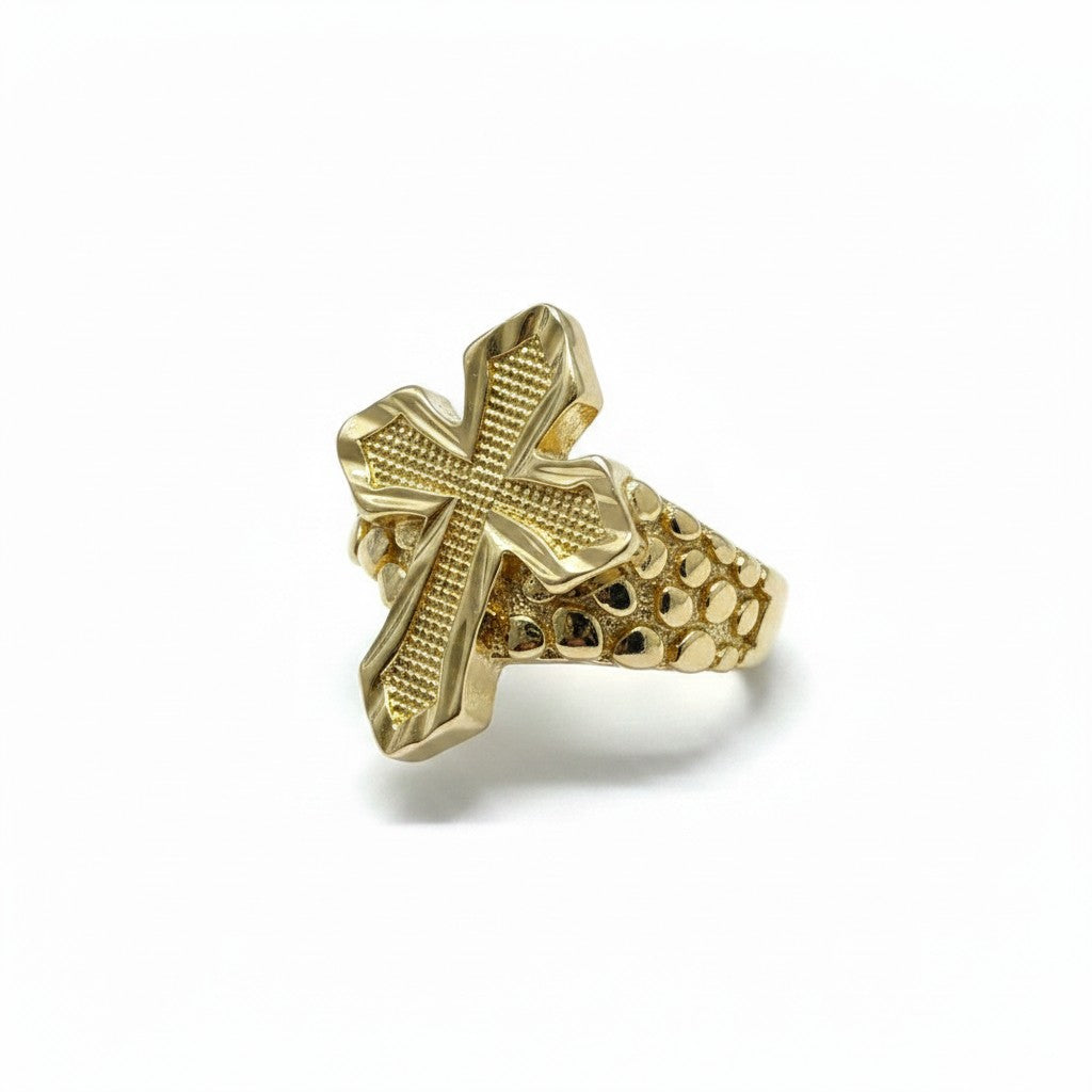 Gold cross-shaped ring on a white background