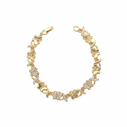 A gold plated link bracelet featuring alternating solid gold butterfly links and butterfly-shaped links paved with small clear stones, displayed on a clean white background.
