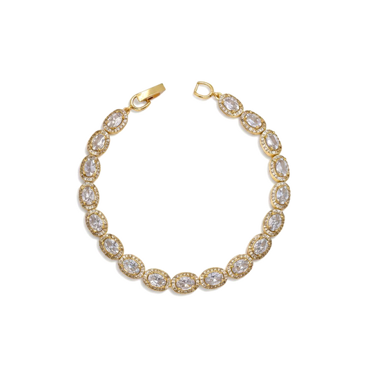 Amafhha Jewels gold-plated tennis bracelet featuring oval-cut cubic zirconia stones with a micro-pave halo setting.
