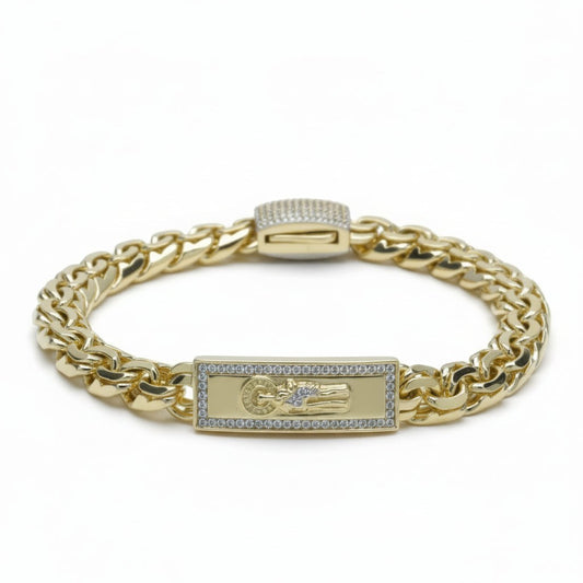 Amafhha Jewels gold-plated curb link ID bracelet with rectangular Virgin Mary plaque and pave-set cubic zirconia stones.